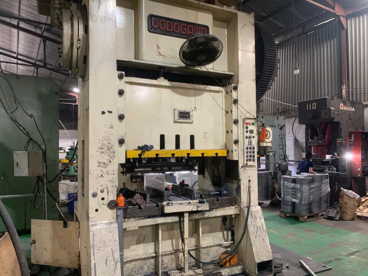 Stamping press on the production floor at Alugos, a DEWIN-verified Vietnamese supplier facility