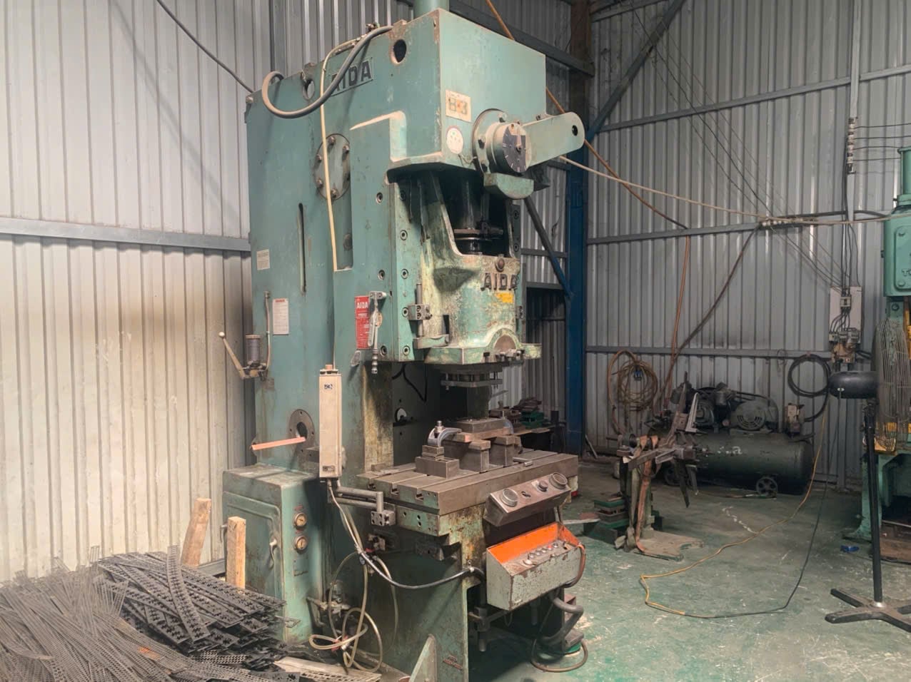 Stamping press on the production floor at Automatic Stamping Mold, a DEWIN-verified Vietnamese supplier facility