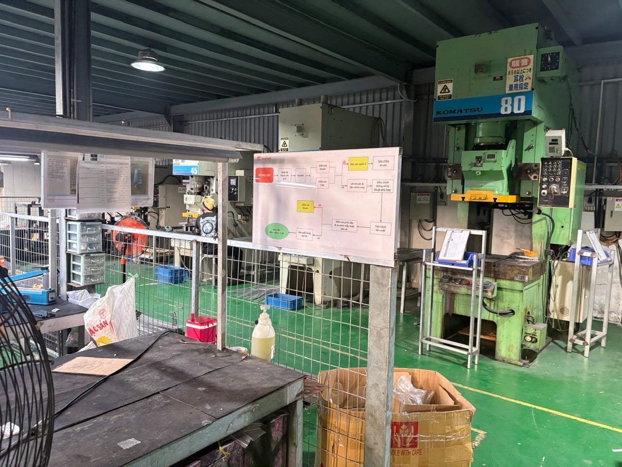 Stamping press on the production floor at Dang Thanh Hardware Trading Manufacture, a DEWIN-verified Vietnamese supplier facility