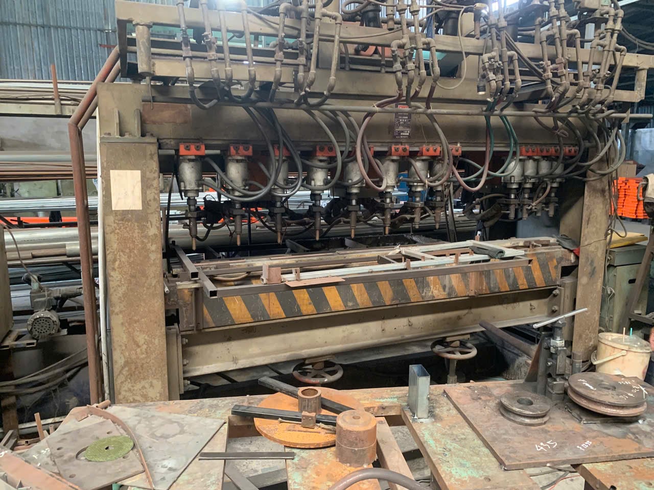 Welding station at Global Mechanical Construction Production, a DEWIN-verified Vietnamese supplier facility