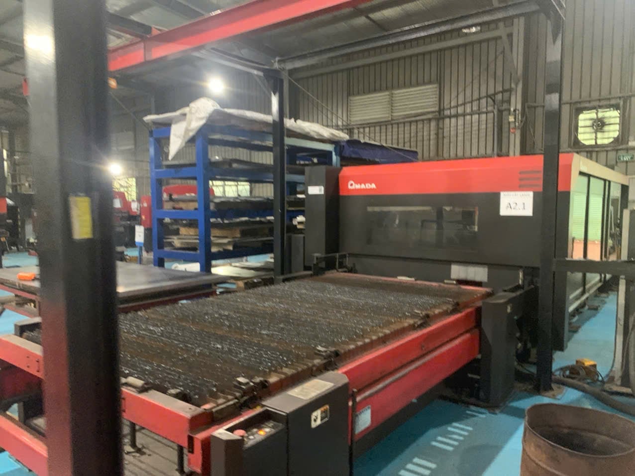 Laser cutting machine running sheet stock at Nbv, a DEWIN-verified Vietnamese supplier facility