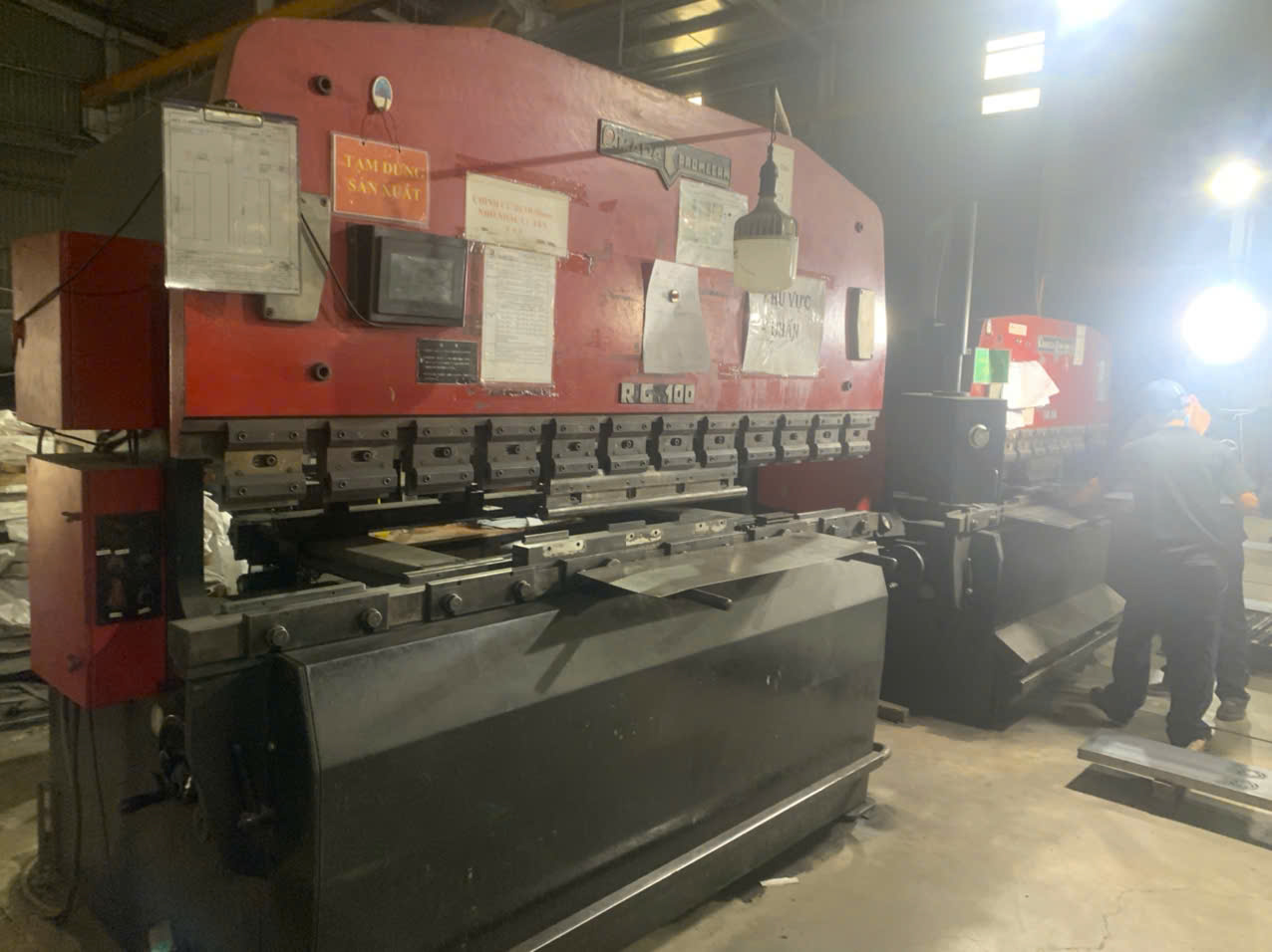 CNC press brake where in-process bend-angle checks are made after setup at a DEWIN-verified Vietnamese supplier facility