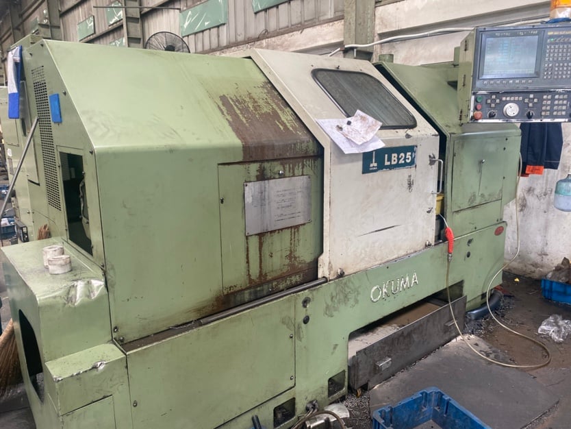 CNC milling machine cutting a part at Alpha Fastener, a DEWIN-verified Vietnamese supplier facility