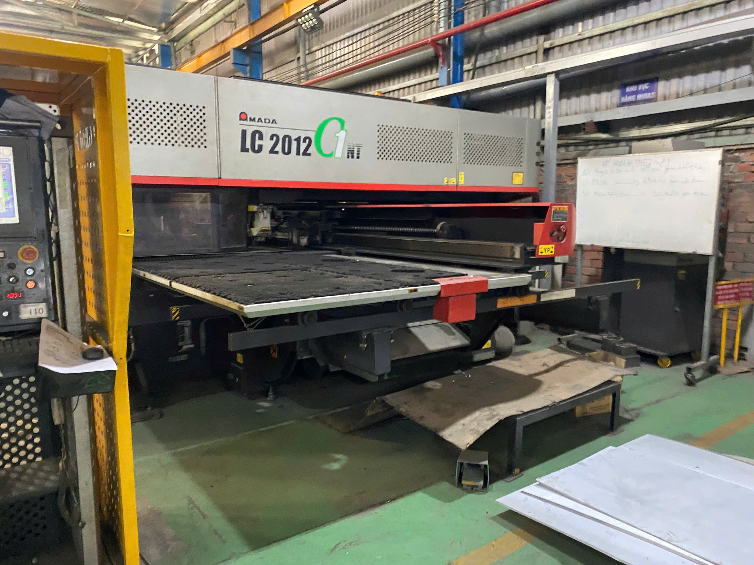 Laser cutting machine running sheet stock at Ntp Group, a DEWIN-verified Vietnamese supplier facility