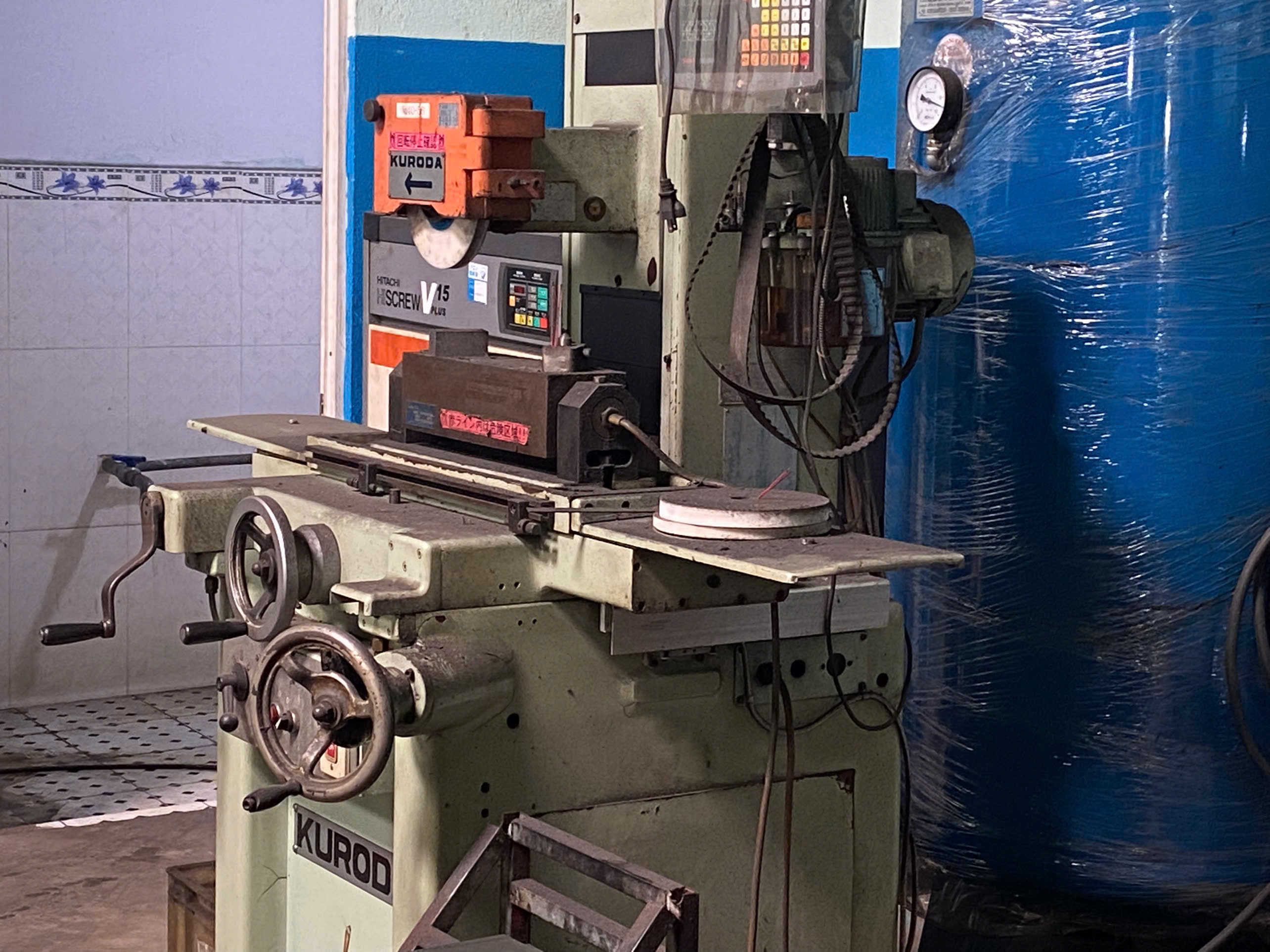 Surface grinding machine at Gia Phat Mold Mechanical Production Trading, a DEWIN-verified Vietnamese supplier facility