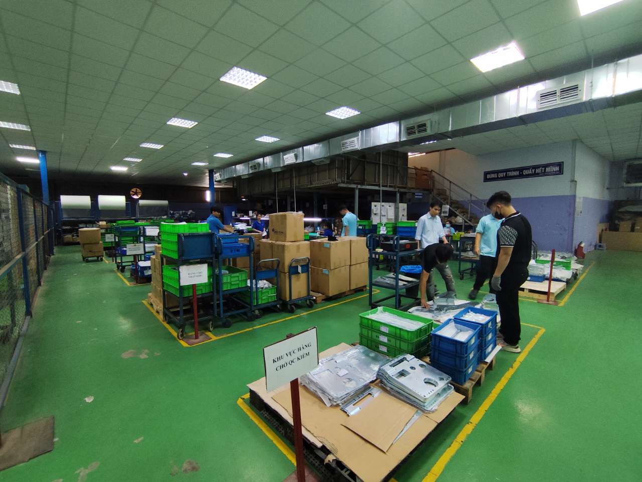 Finished parts staged in the inspection queue for cosmetic and dimensional checks at a DEWIN-verified Vietnamese supplier facility